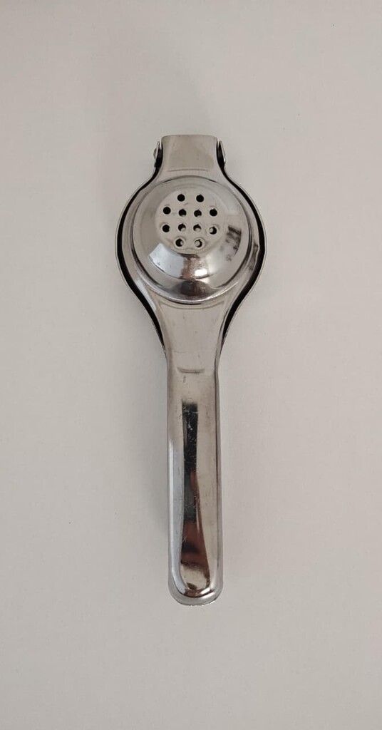EXPRIMIDOR DE LIMON DE ACERO DE 20CM